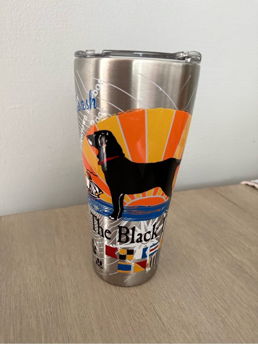 Stainless Steel Tumbler with Black Dog Graphic - Orange Accent